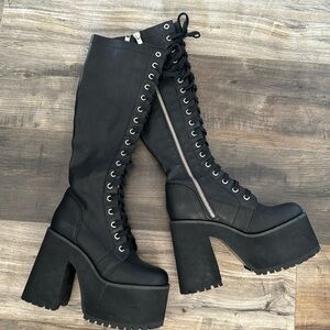 Black laced up knee boots